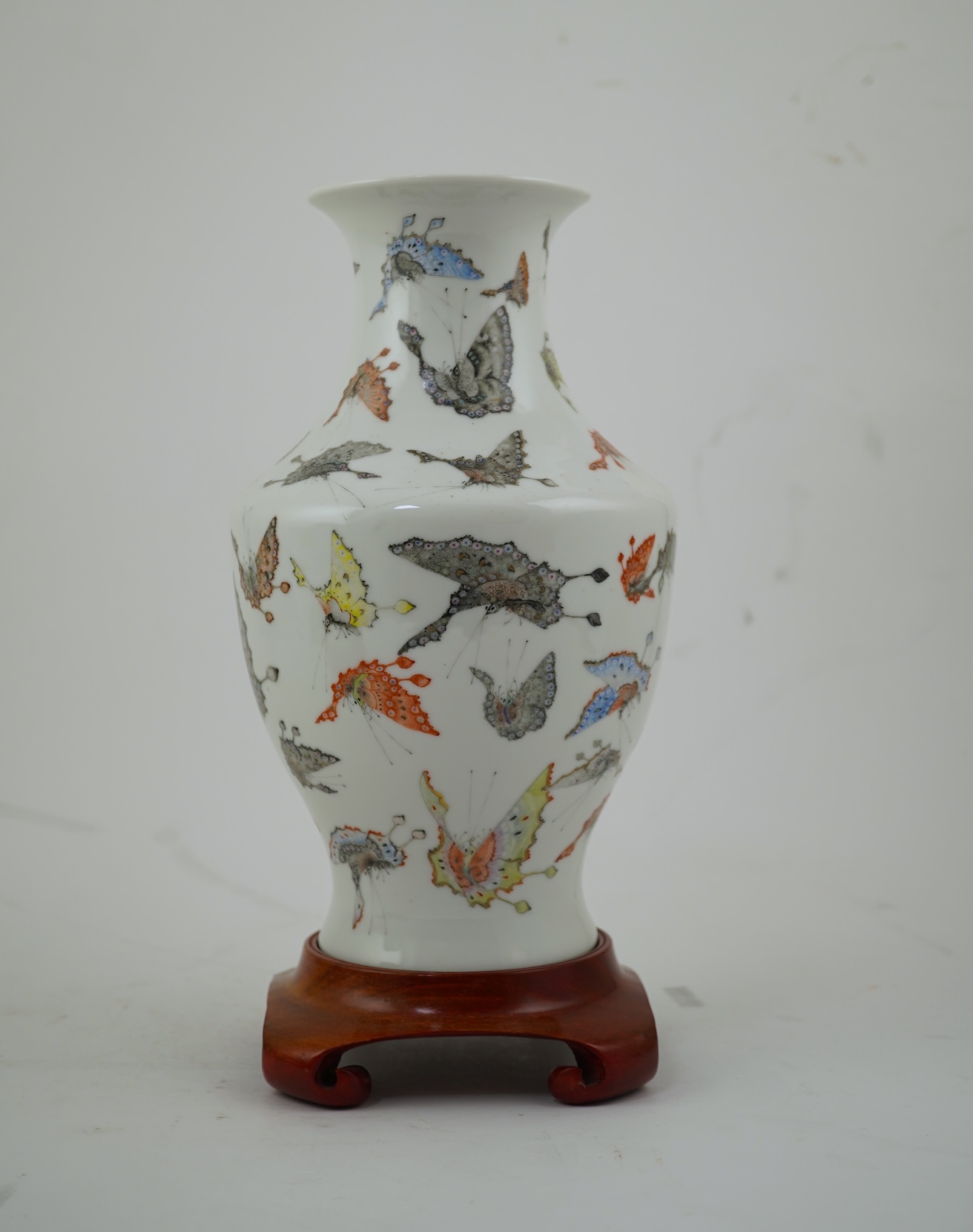 A Chinese enamelled porcelain ‘Hundred Butterfly’ vase, Qianlong mark, Republic period